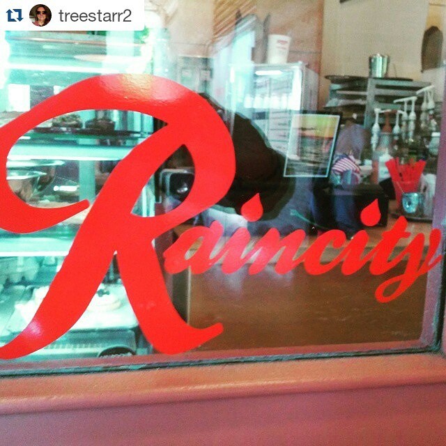 The Raincity Sign